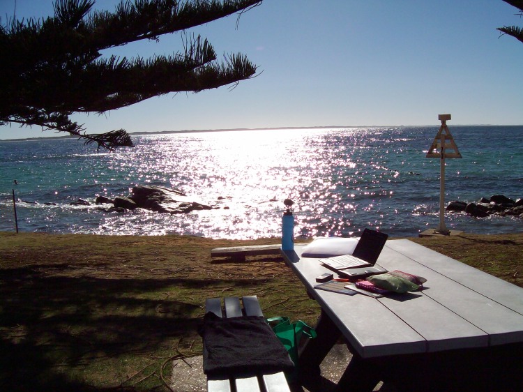 Picnic bench at The Whaling, Flinders Bay set up as a writing desk